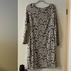 Beautiful lace overlay dress with long sleeves in lace. Does run a little small